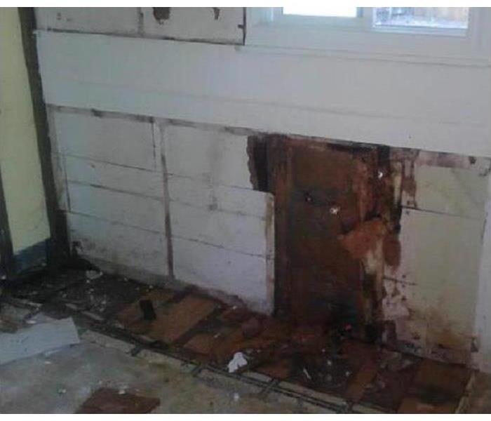 Kitchen wall severely damaged by water leakage